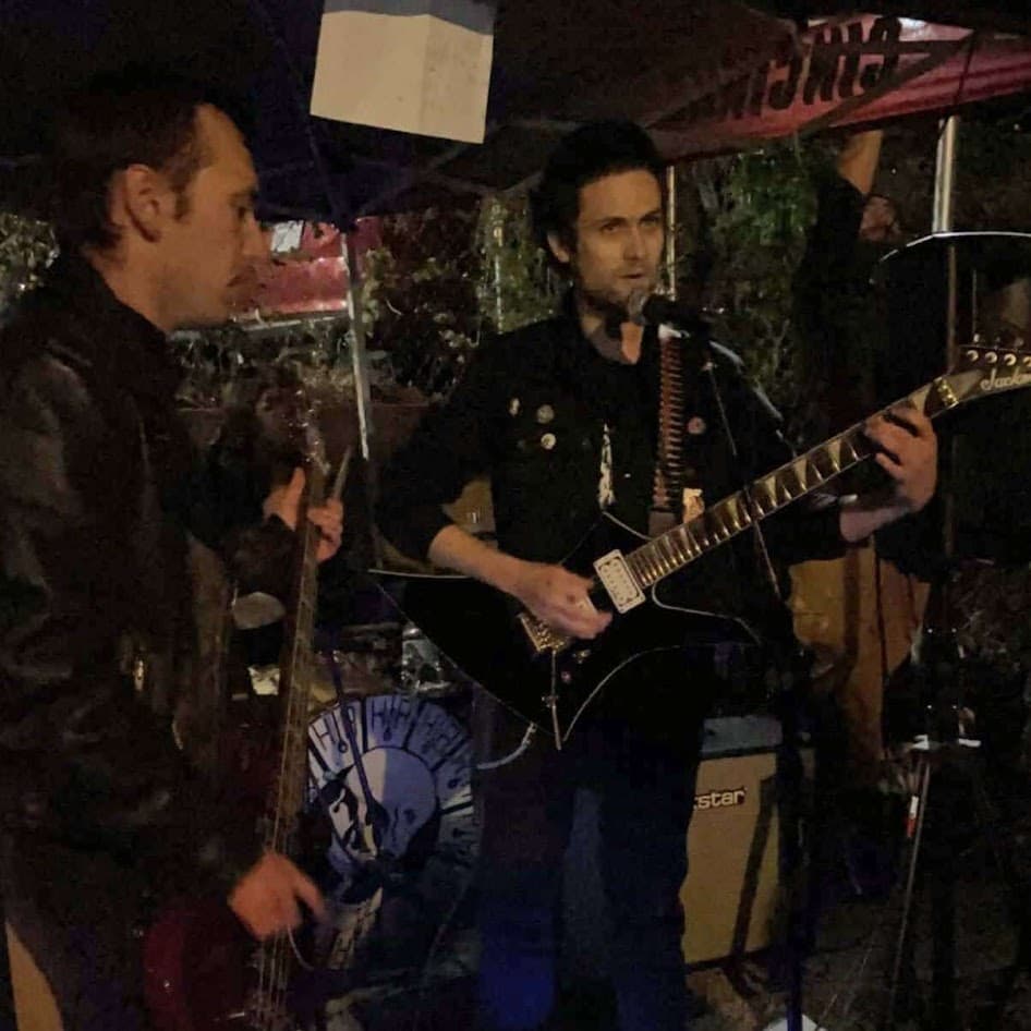 Bog performing outside at The Pit shortly before the cops shut the show down