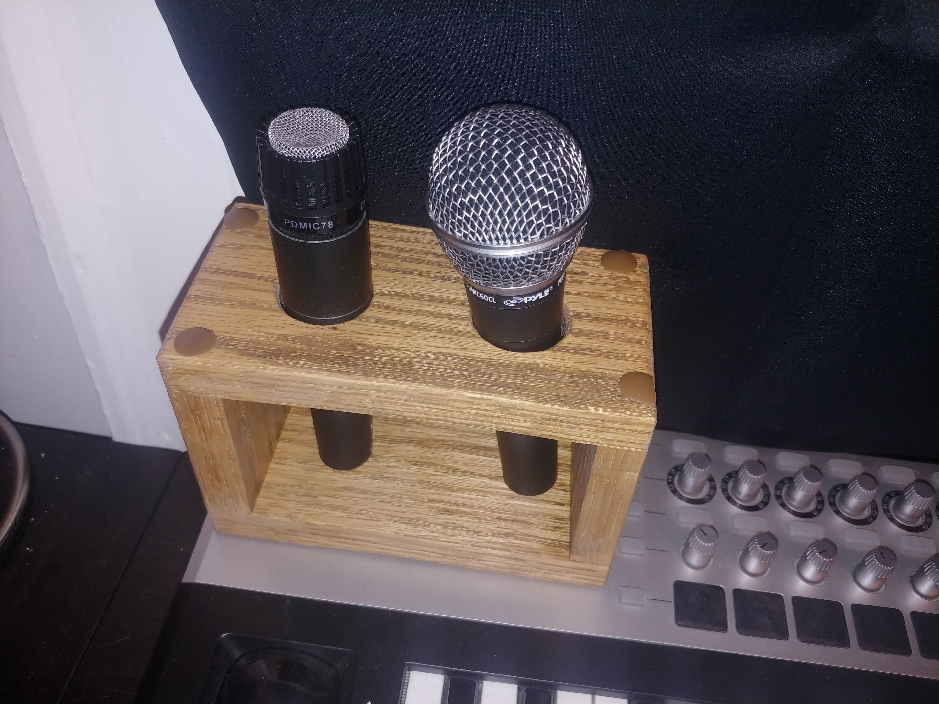 The holder with mics on it