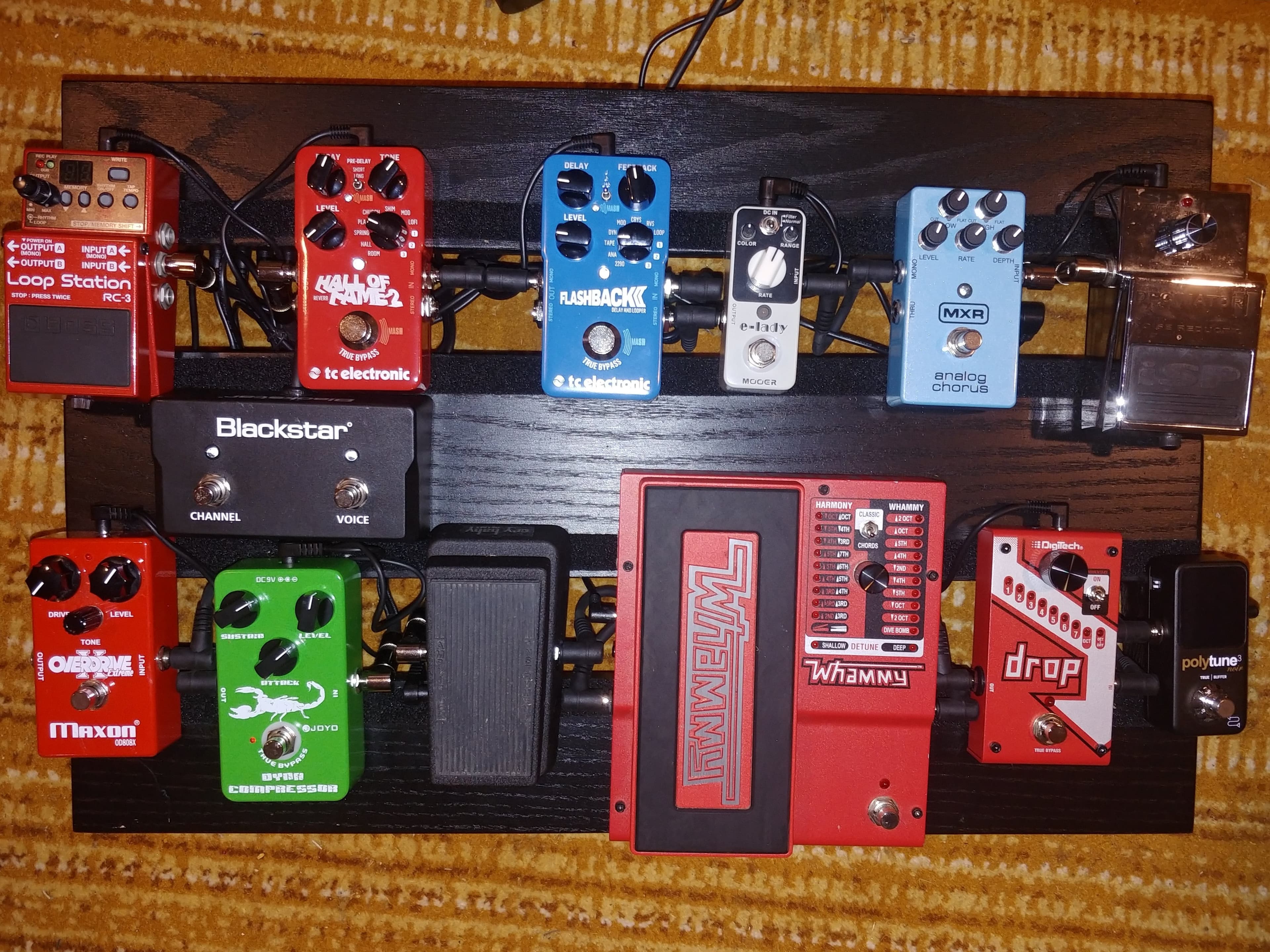The pedal board with pedals on it